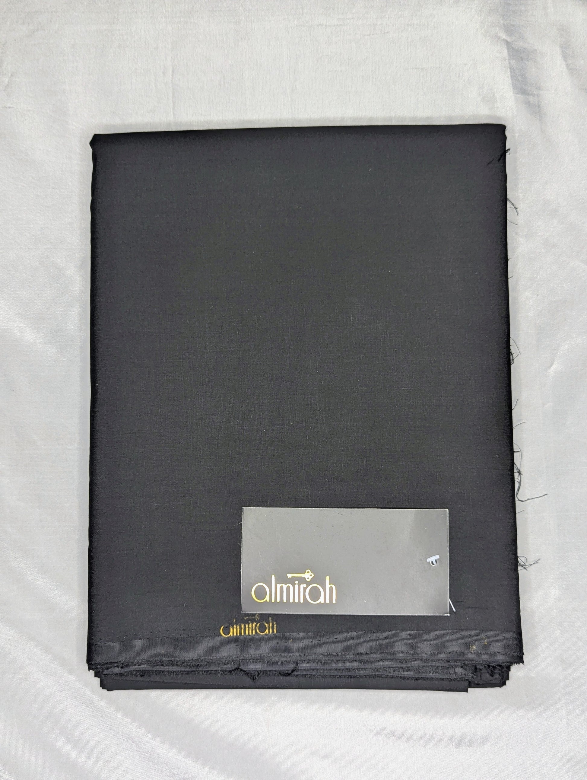Black prayer mat with 'almirah' branding on a white backgroundAlmira Fabric, Almira Wash and Wear, Unstitched Fabric, Plain Fabric, Wash and Wear Material, Summer Fabric, Formal Fabric, Casual Wear Fabric, Mens Fabric, Gents Wash and Wear, Plain Wash & Wear, Soft Fabric, Comfortable Fabric, Durable Cloth, Wrinkle-Free Fabric, Easy Care Fabric, Fine Quality Cloth, Unstitched Plain Suit, Solid Color Fabric, Polyester Viscose Blend, Smooth Finish Fabric, Shalwar Kameez Fabric, Kameez Shalwar Material, Kurta Fa