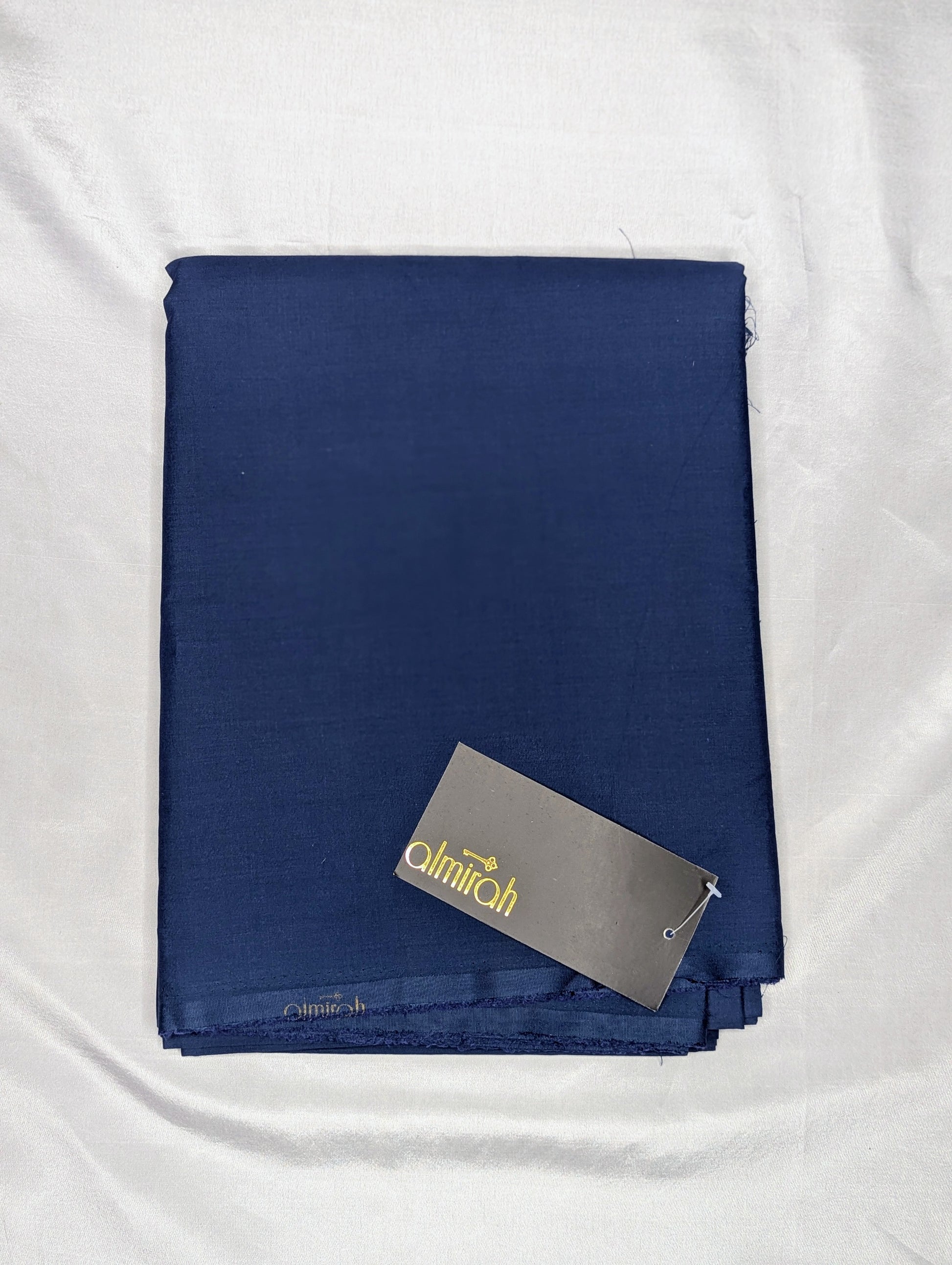 Folded navy blue towel with a gray tag on a white backgroundAlmira Fabric, Almira Wash and Wear, Unstitched Fabric, Plain Fabric, Wash and Wear Material, Summer Fabric, Formal Fabric, Casual Wear Fabric, Mens Fabric, Gents Wash and Wear, Plain Wash & Wear, Soft Fabric, Comfortable Fabric, Durable Cloth, Wrinkle-Free Fabric, Easy Care Fabric, Fine Quality Cloth, Unstitched Plain Suit, Solid Color Fabric, Polyester Viscose Blend, Smooth Finish Fabric, Shalwar Kameez Fabric, Kameez Shalwar Material, Kurta Fabr