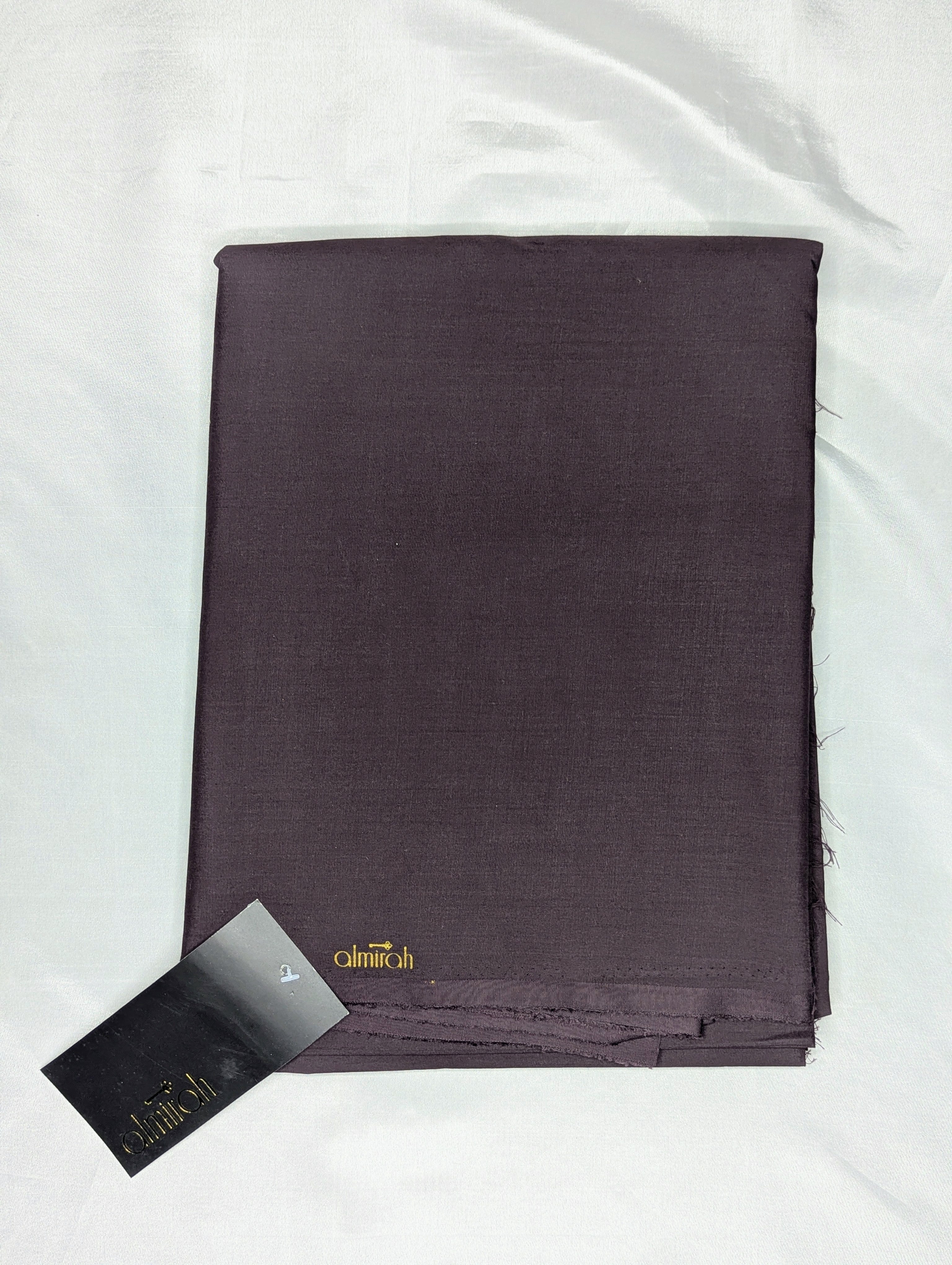 Folded dark purple fabric with a visible brand label on a white Almira Fabric, Almira Wash and Wear, Unstitched Fabric, Plain Fabric, Wash and Wear Material, Summer Fabric, Formal Fabric, Casual Wear Fabric, Mens Fabric, Gents Wash and Wear, Plain Wash & Wear, Soft Fabric, Comfortable Fabric, Durable Cloth, Wrinkle-Free Fabric, Easy Care Fabric, Fine Quality Cloth, Unstitched Plain Suit, Solid Color Fabric, Polyester Viscose Blend, Smooth Finish Fabric, Shalwar Kameez Fabric, Kameez Shalwar Materibackground