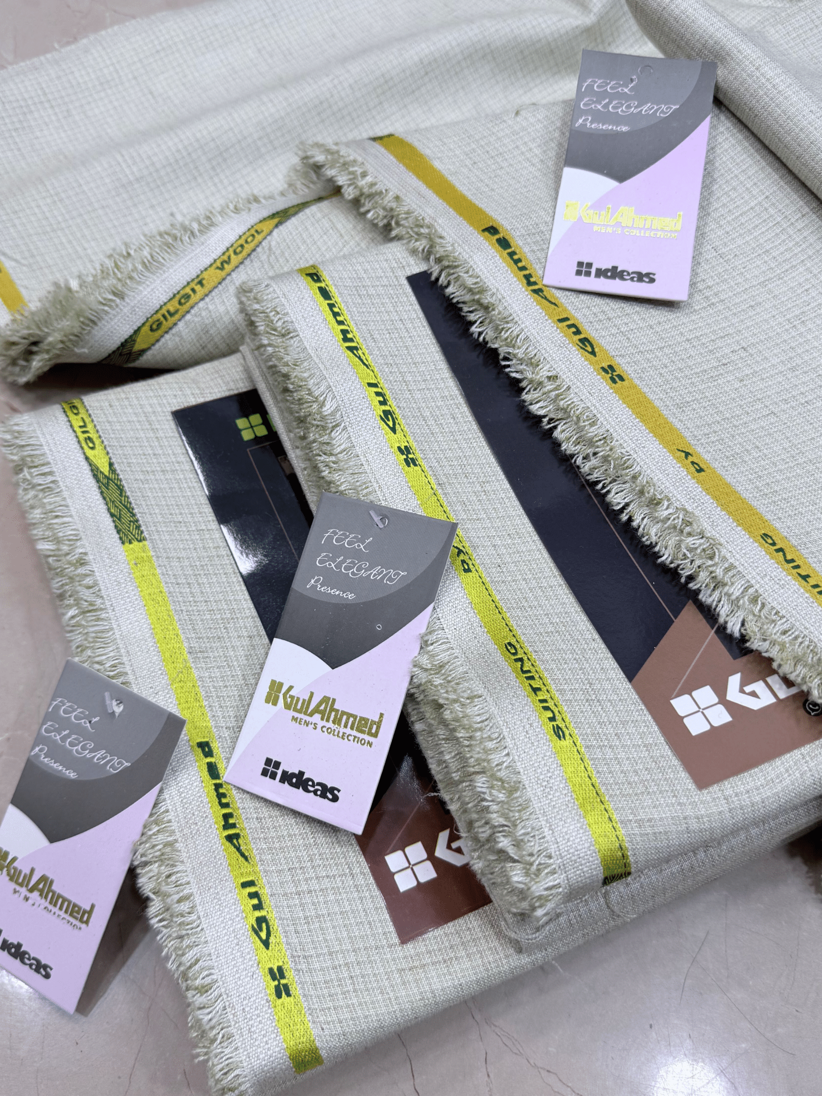 Textiles with branding tags on a light backgroundGulAhmedMen,UnstitchedFabric,MensSuiting,GilgitWool,IdeasMens,PremiumFabricPakistan,WinterSuiting,GulAhmedSuits,SophisticatedOutfits,ShalwarKameezFabric, GulAhmedFabric,IdeasMen,UnstitchedSuits,MenWoolFabric,WinterCollection,MensDressMaterial,UnstitchedWoolSuit,GulAhmedOnline,MensEasternWear,PakistaniSuits, LuxuryMensFabric,FineWool,GilgitWoolSuiting,ElegantPresence,ClassicMenswear,UnstitchedWinter,FormalSuiting,GentlemanFabric,GulAhmedNewCollection,LatestMen