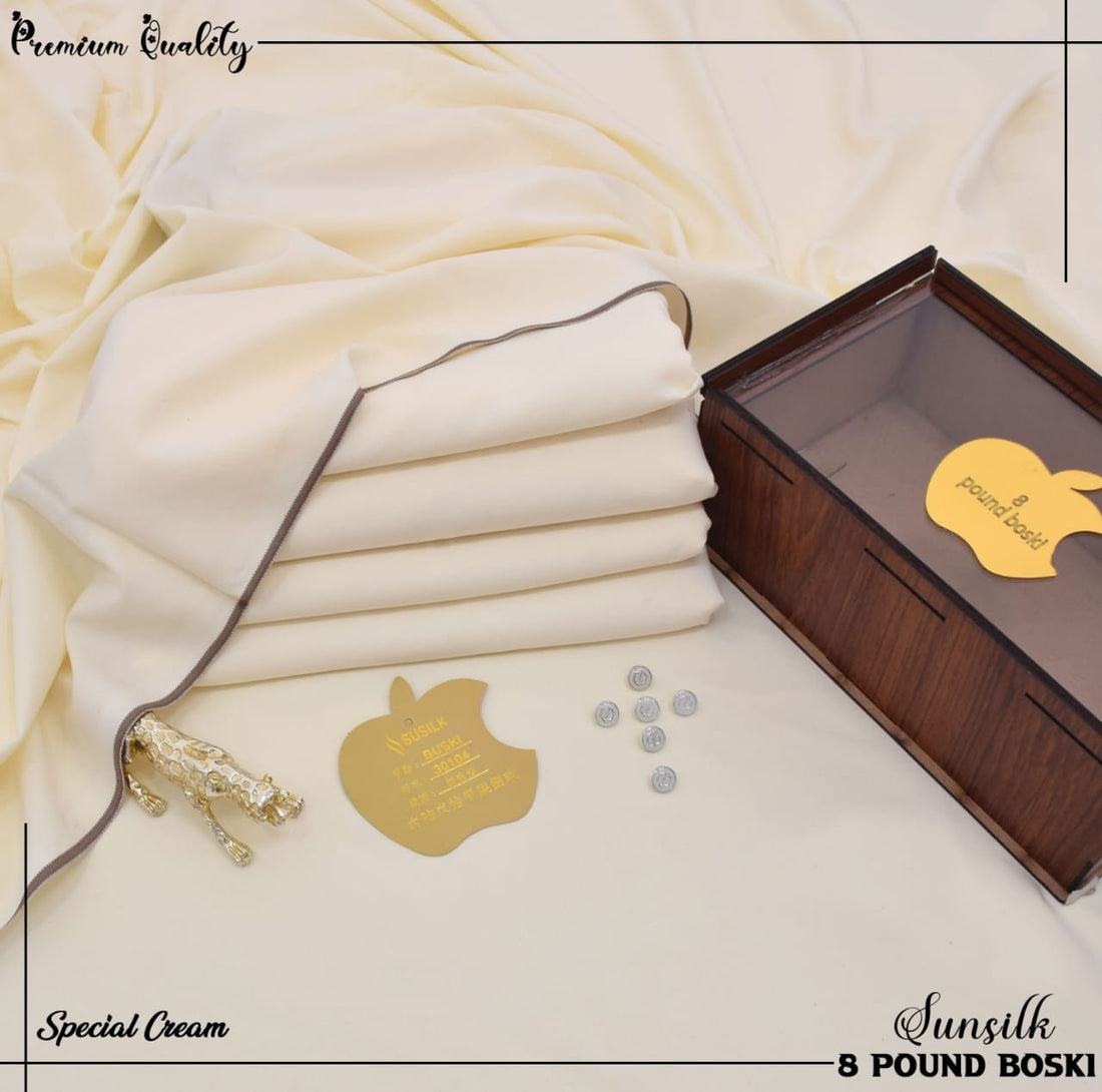 Boxed product with a yellow label on a beige fabric backgroundBoski Fabric, Boski Shalwar Kameez, Men's Boski Suit, Original Boski, Unstitched Boski Fabric, Pure Silk Boski, Premium Boski, Luxury Fabric for Men, Soft Boski, White Boski, Off-White Shalwar Kameez, Formal Wear Fabric, China Boski, 8 Pound Boski, Traditional Menswear, Boski Kurta, Stitched Boski Suit, Boski Price Pakistan, Designer Boski, Best Boski Cloth, Boski Silk, Silk Blend Fabric, Resham Silk Boski, Spun Silk Boski, Boski For Summer, Bosk